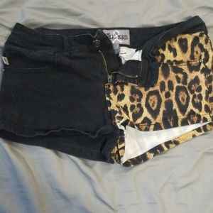 Half leopard print denim shorts